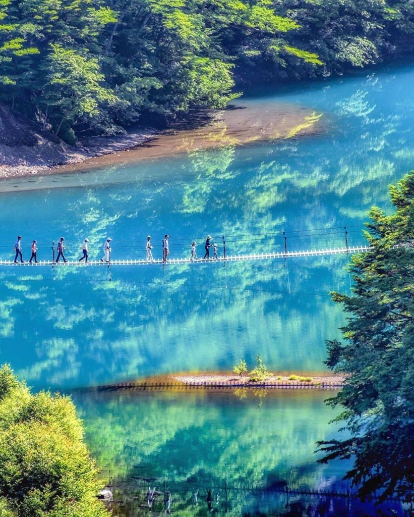 Visit Japan: Walking above this milky blue lake at Shizuoka Prefecture’s Yume no Tsuribashi S… Walking above this milky blue lake at Shizuoka Prefecture's Yume no Tsuribashi S...