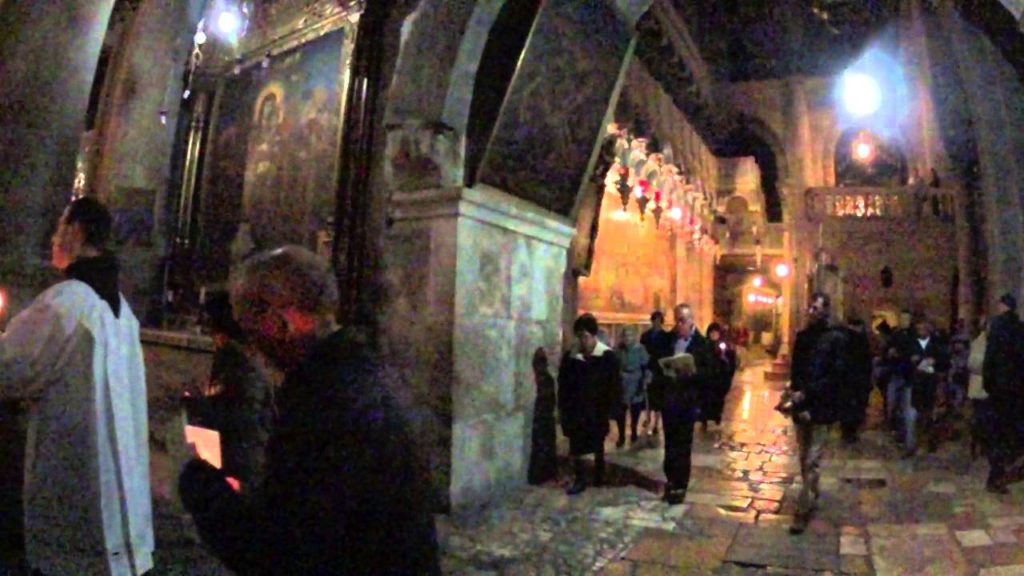 Catholic procession (Franciscan) in the Church of the Holy Sepulchre, Jerusalem, Israel