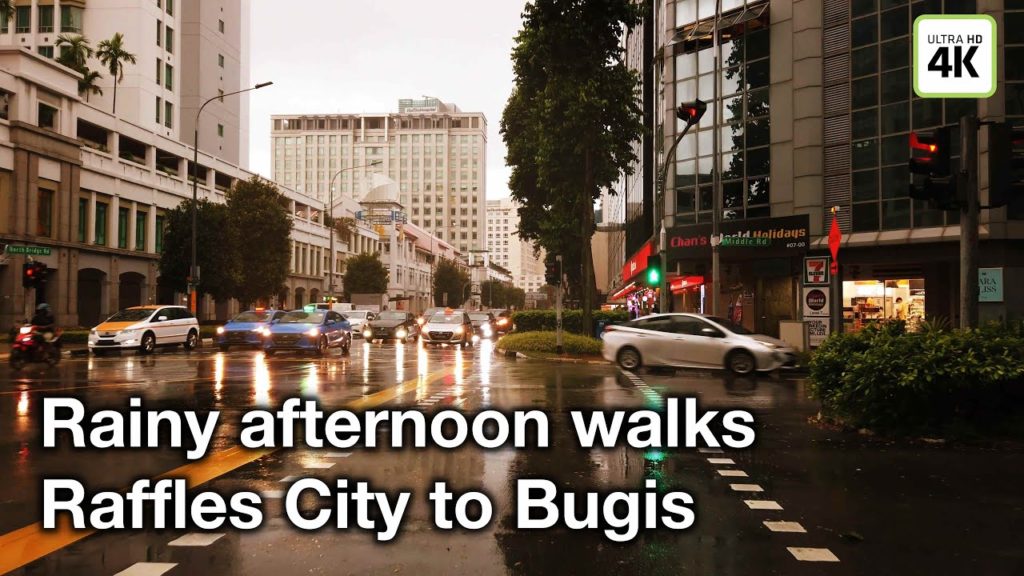 Rainy afternoon walks from Raffles City to Bugis Junction [Singapore] 4K & Binaural Sound
