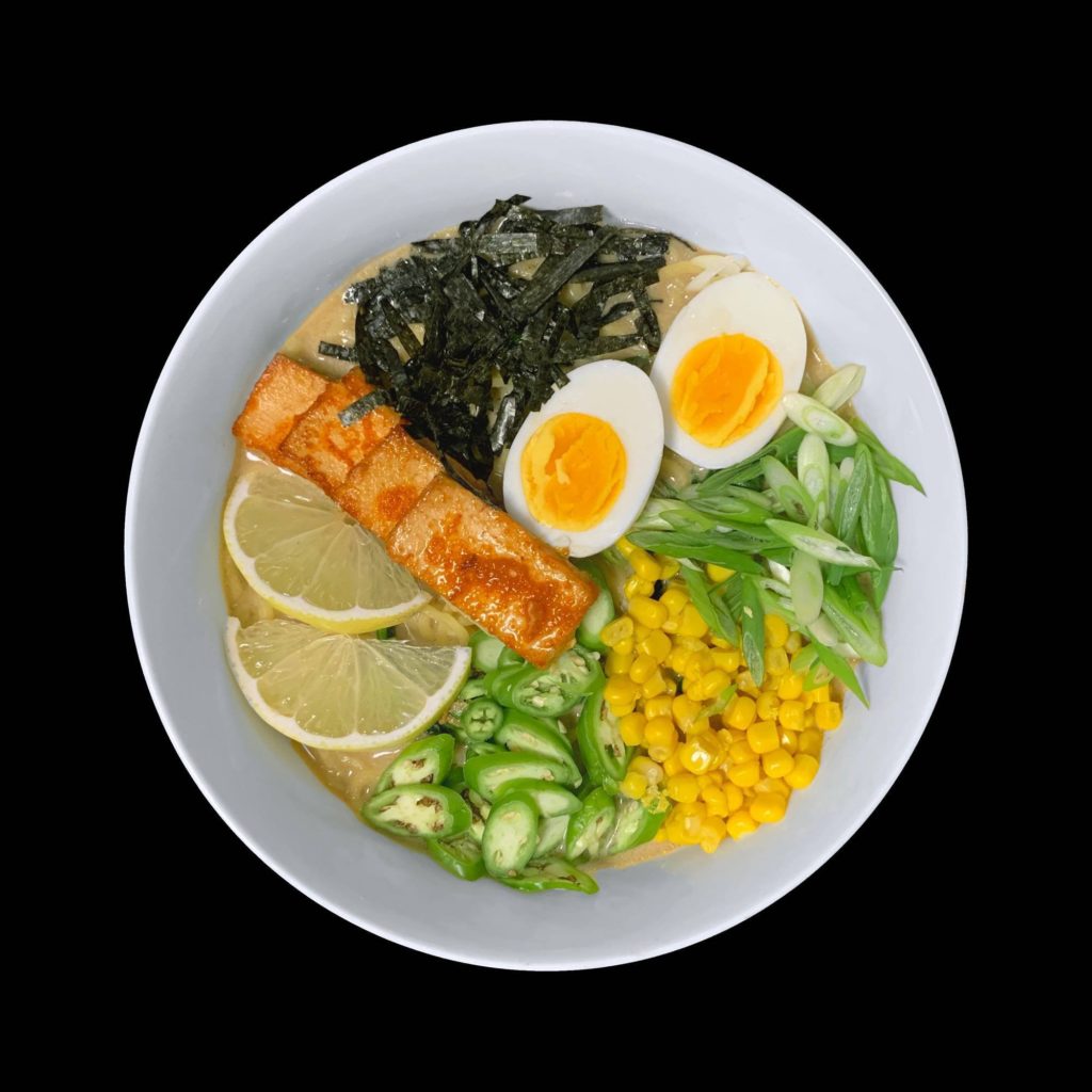 Homemade peanut miso ramen with sriracha baked tofu and imported Japanese noodles.