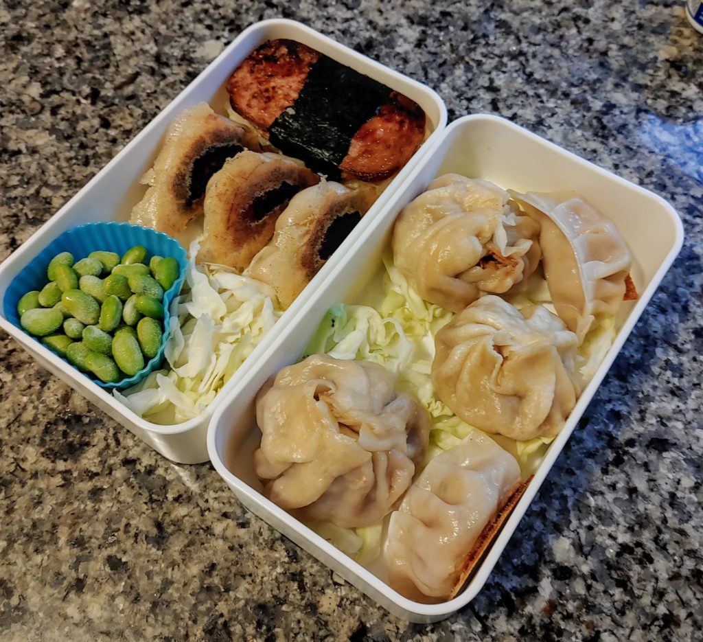 Bento with musubi, gyoza, bao, and edamame!