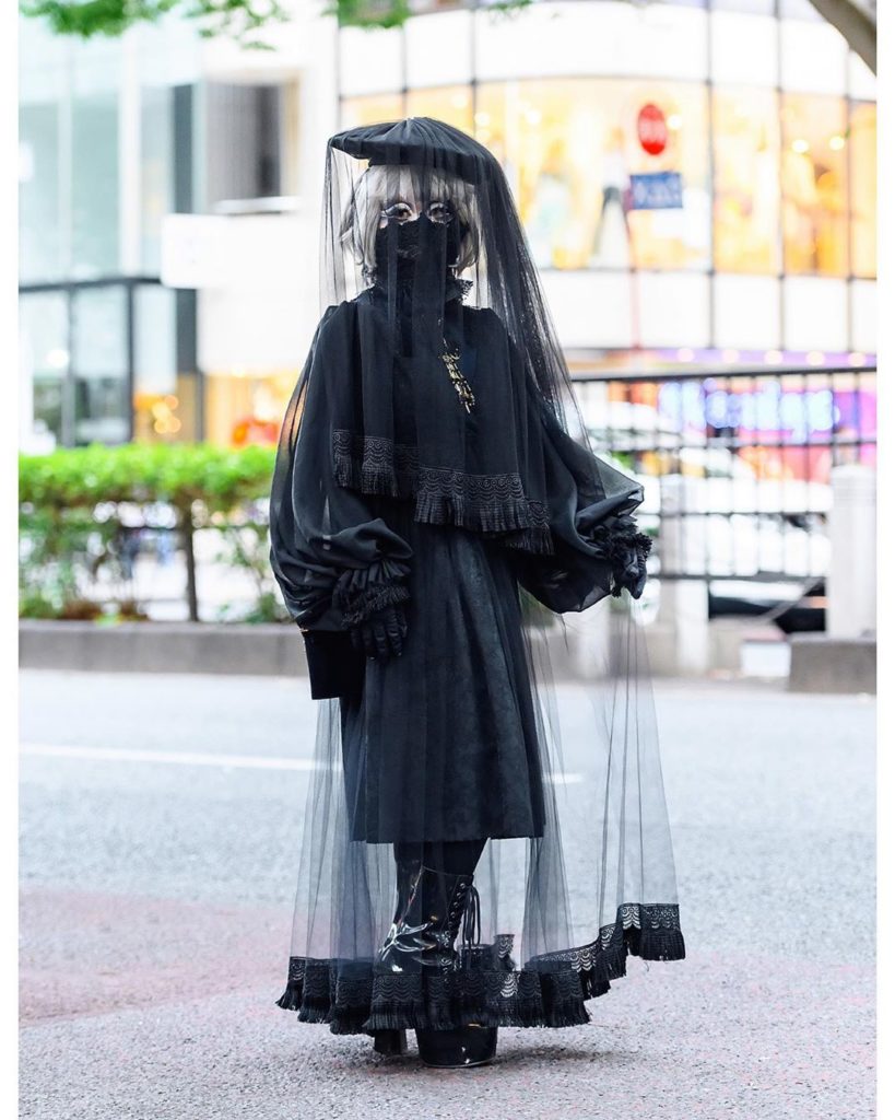Japanese shironuri artist Minori (@minori00mon) on the street in Harajuku wearin...
