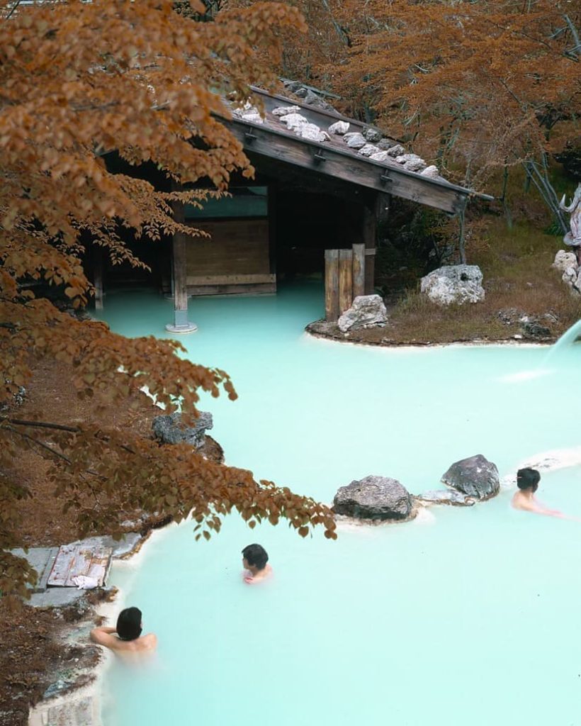 Ease yourself into the ethereal and healing milky waters of Shirahone Onsen in t...