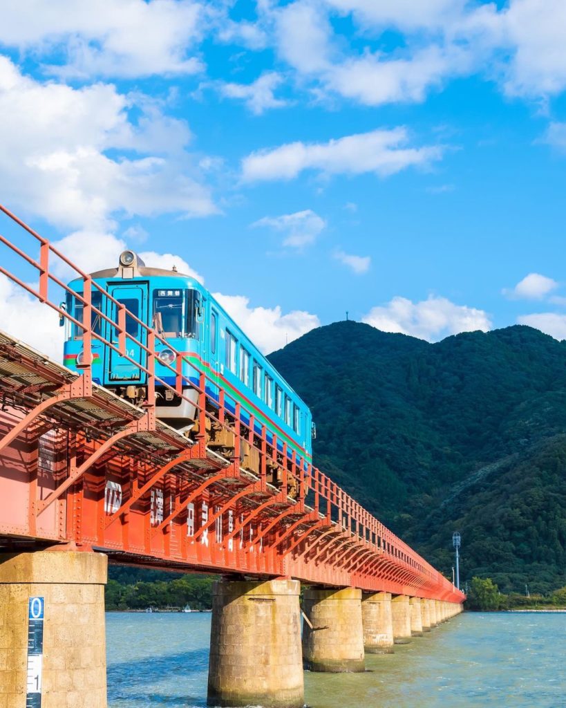The Yura River Bridge is known for its iconic red color and stunning views of th...