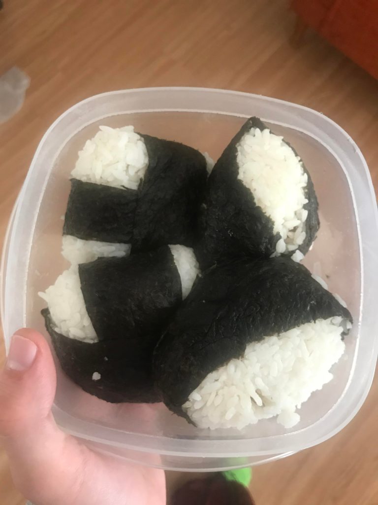 Onigri for my lunch. Has salmon as a filling seared and then cooked in soy sauce and sake.