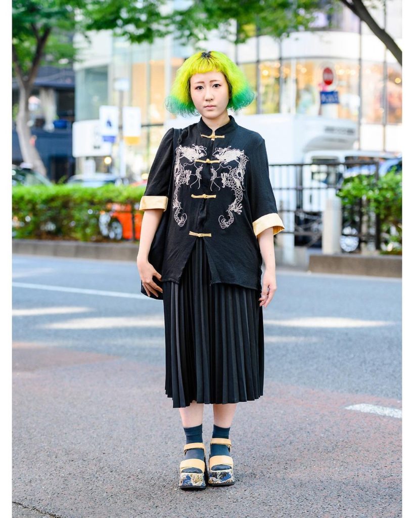 Juan (@ju_in618) on the street in Harajuku with a green-yellow hairstyle, twin d...