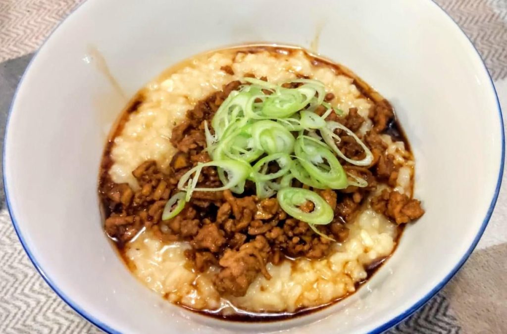 [Homemade] First time making Congee. Topped with sticky ginger pork mince.