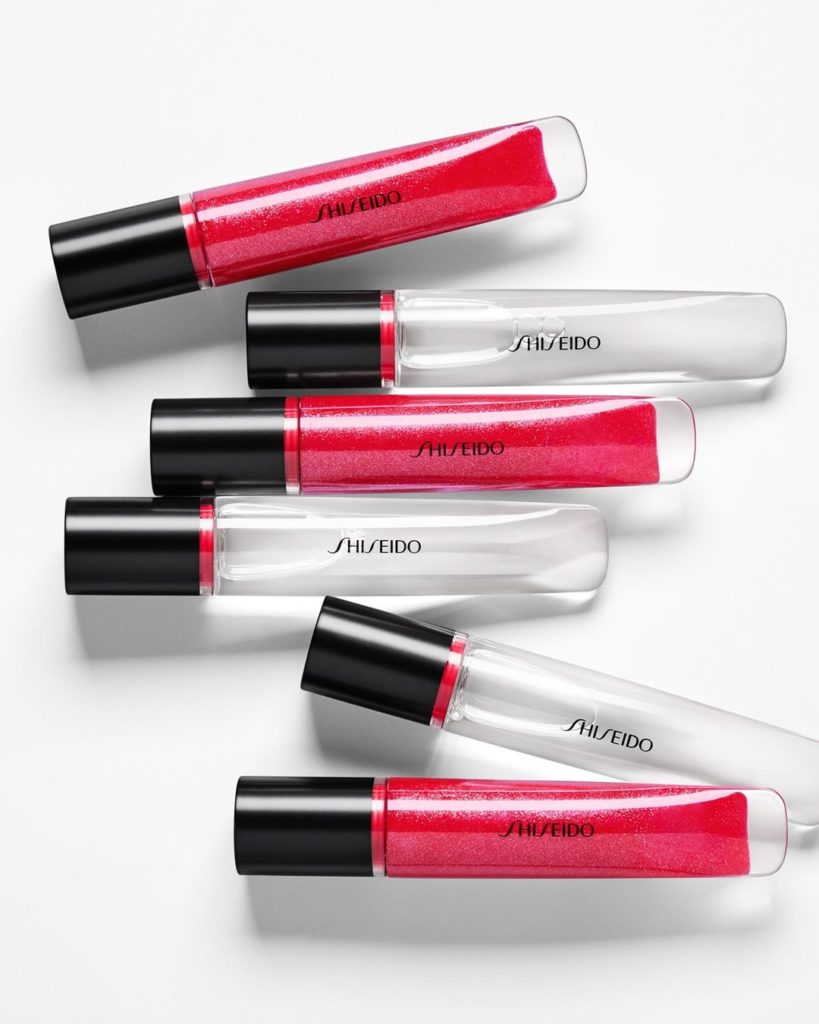 SHISEIDO: ’Tis the season to shimmer and shine. Shimmer GelGloss in Shin-Ku Red wraps lips… ’Tis the season to shimmer and shine. Shimmer GelGloss in Shin-Ku Red wraps lips...