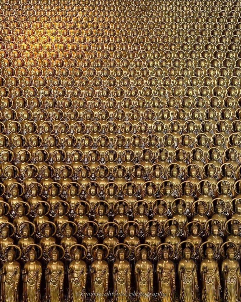 Can you count how many Buddhist statues are pictured in this photo? We might not...