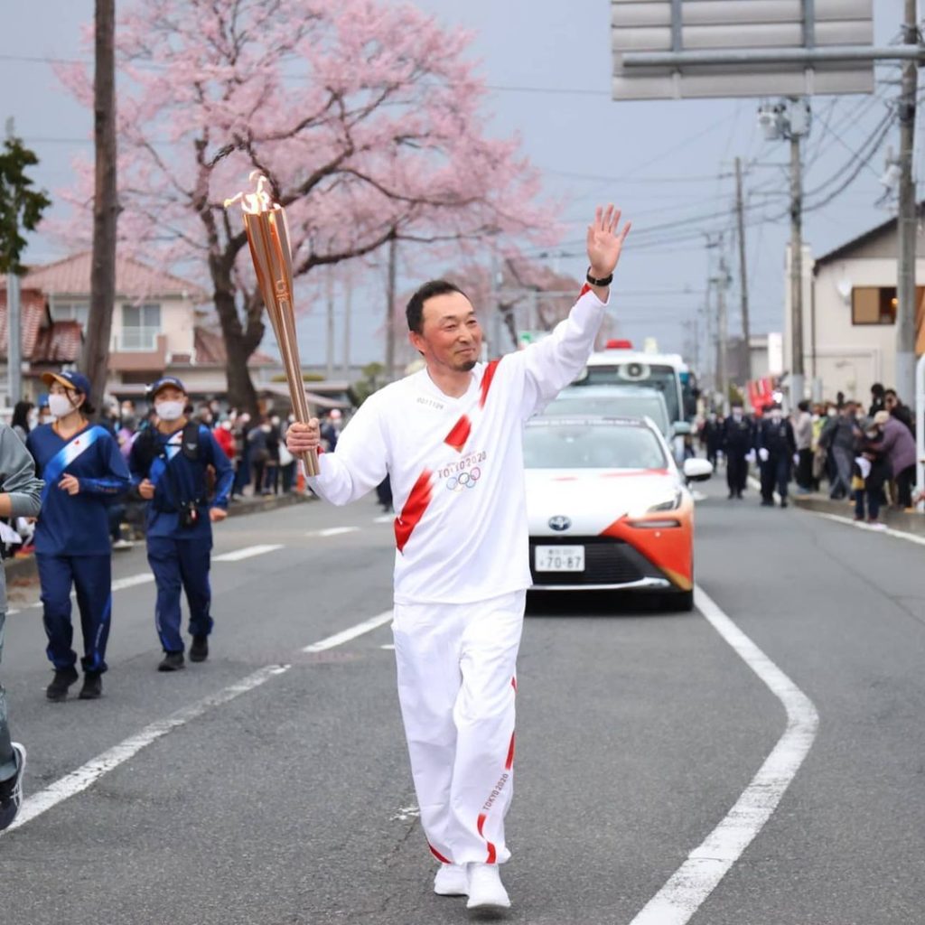 The feeling of being a torchbearer... 

The Olympic flame is lighting the street...