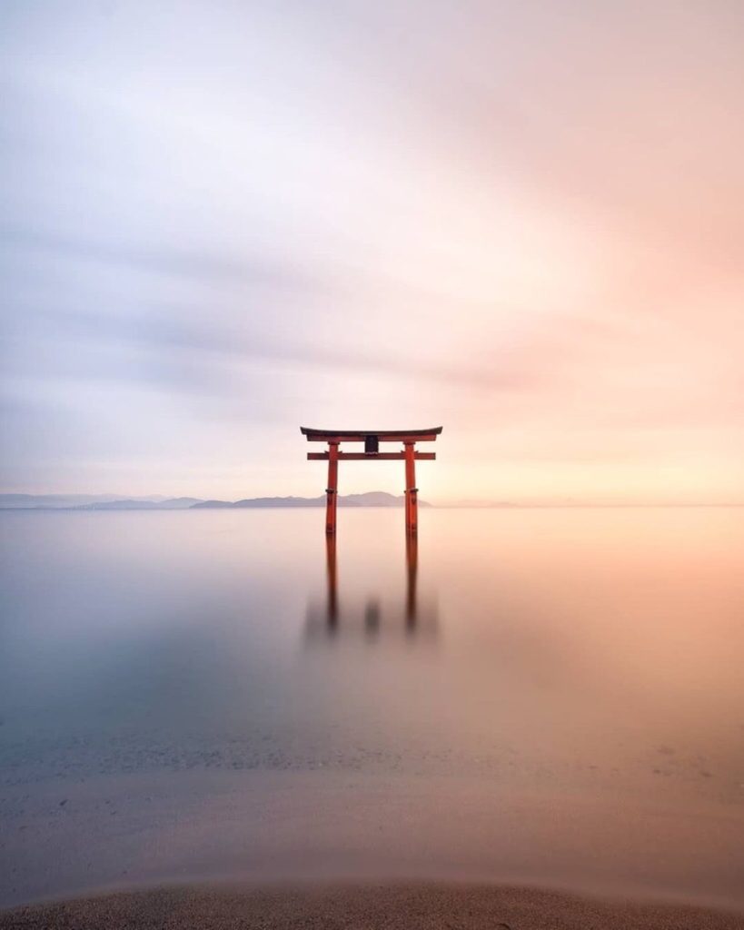 Visit Japan: The Shirahige Shrine’s torii gate sits in the middle of Lake Biwa. It has become… The Shirahige Shrine’s torii gate sits in the middle of Lake Biwa. It has become...