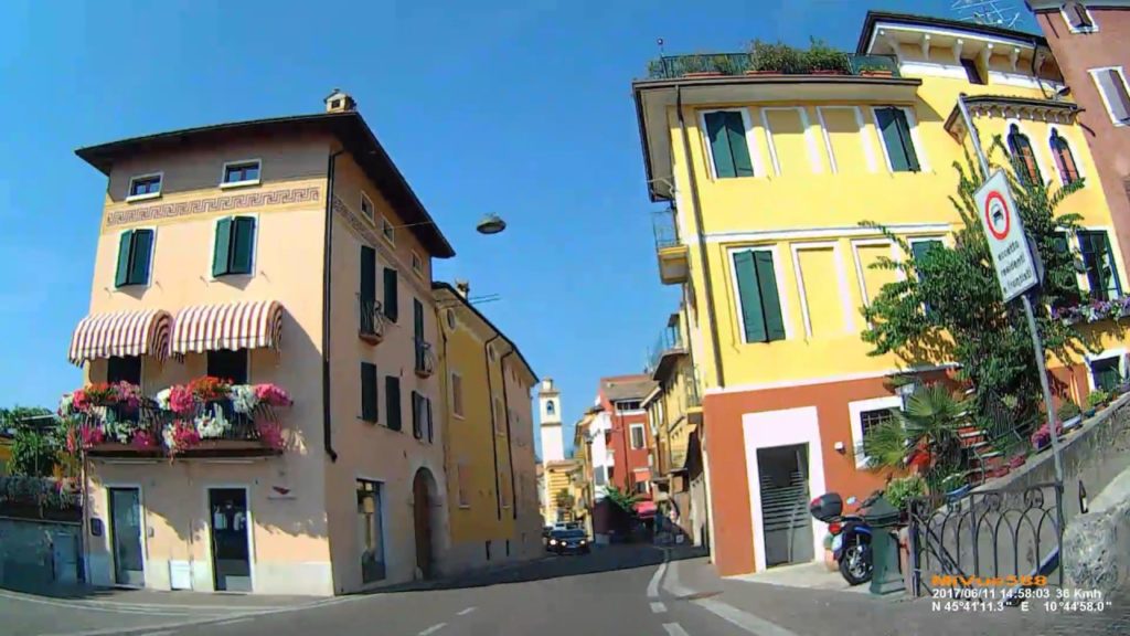 I: Driving through Brenzone sul Garda along Lake Garda. Veneto. June 2017