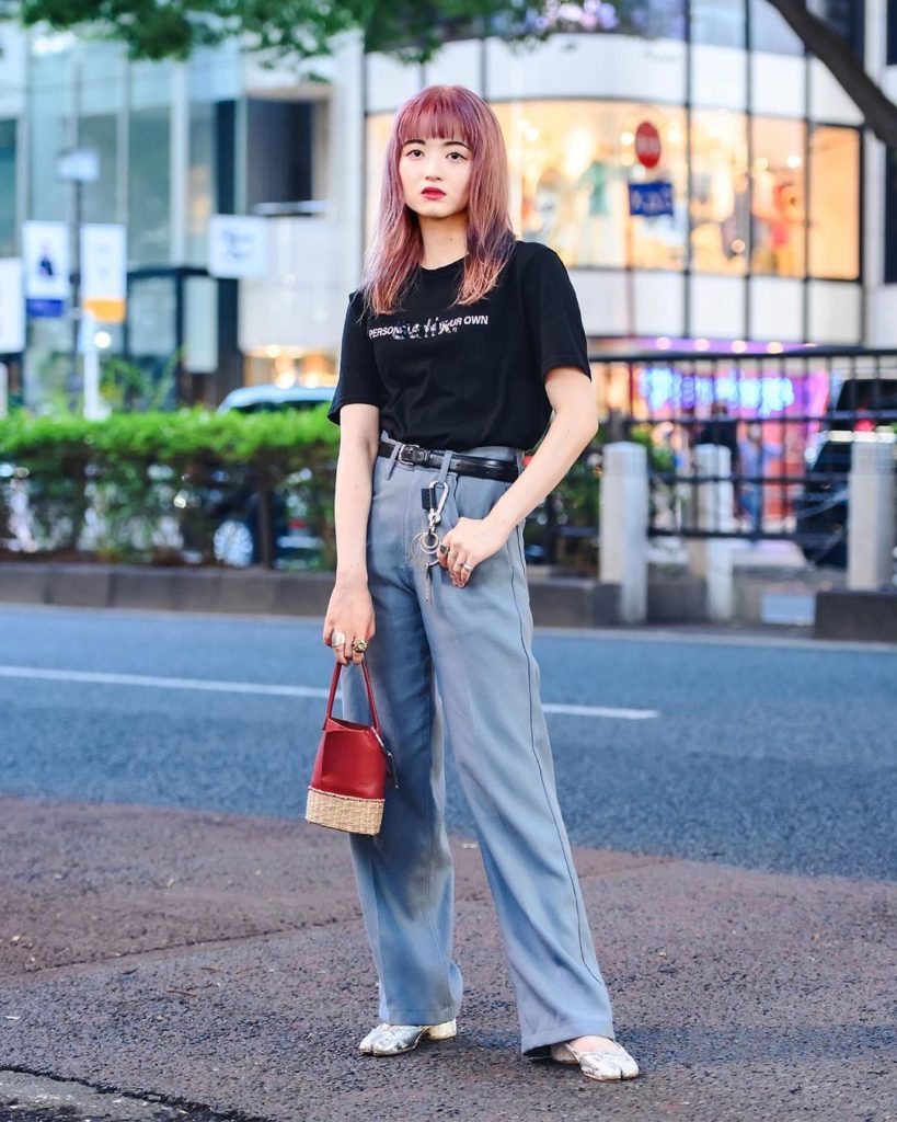 Japanese fashion industry staffer Rio (@ppg_dnc) on the street in Harajuku weari...