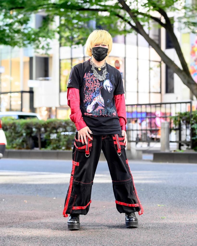 21-year-old Japanese rapper Ryo (@timid_row) on the street in Harajuku wearing a...