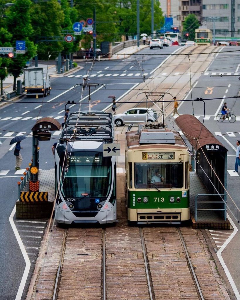Hiroshima’s streetcar system is unique in that both old and new cars can sometim...