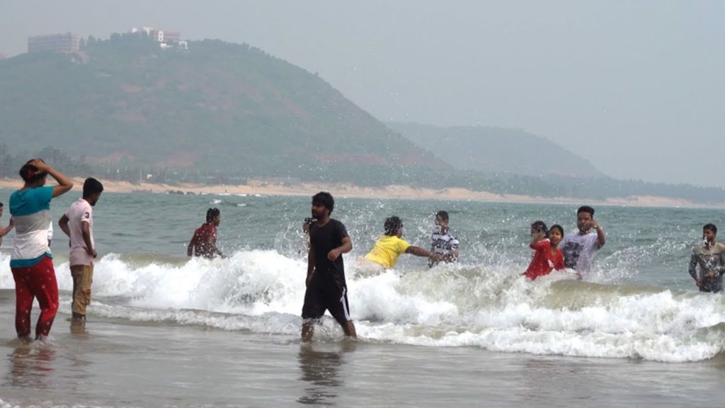 People are Enjoying Sea Bath at Rushikonda Beach, Visakhapatnam, India in 4k ultra HD