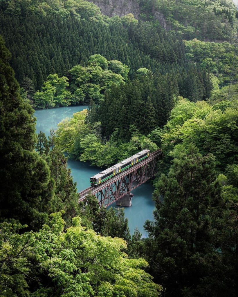 Toot toot! The Tadami Line train coming through. This local line running through...