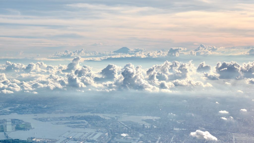 Departing view of Mount Fuji, Tokyo, and clouds