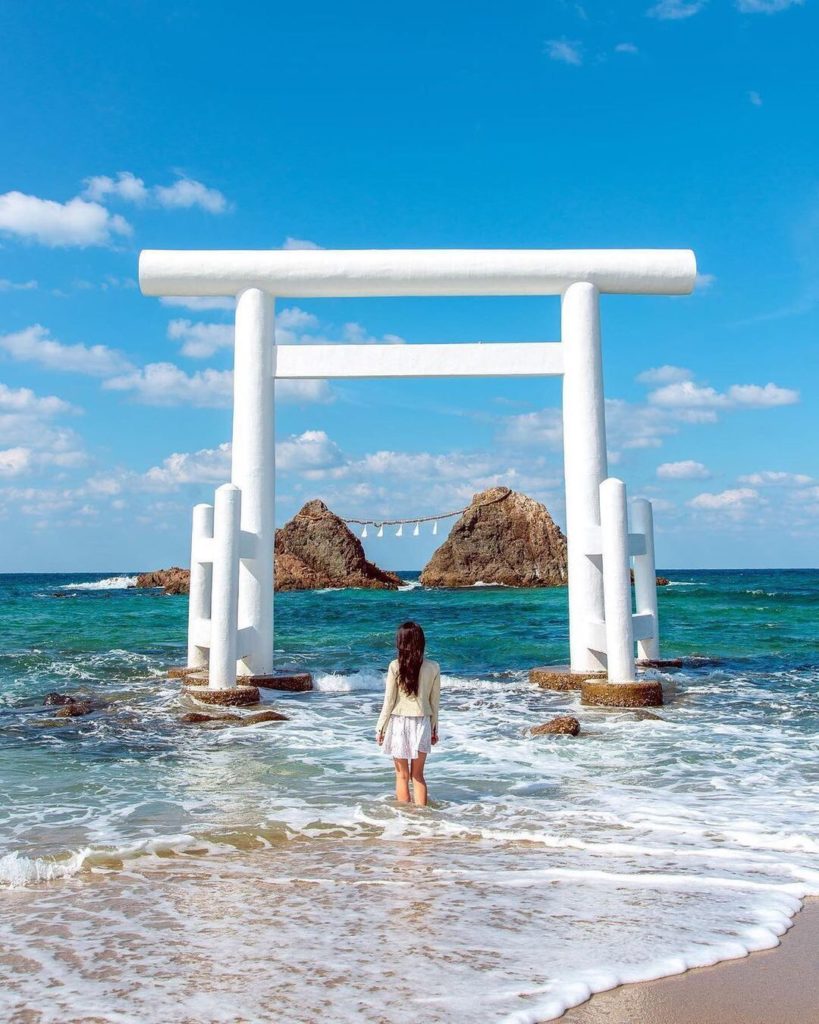 The white torii gate of Sakurai Shrine, which stands at Sakurai Futamigaura, app...