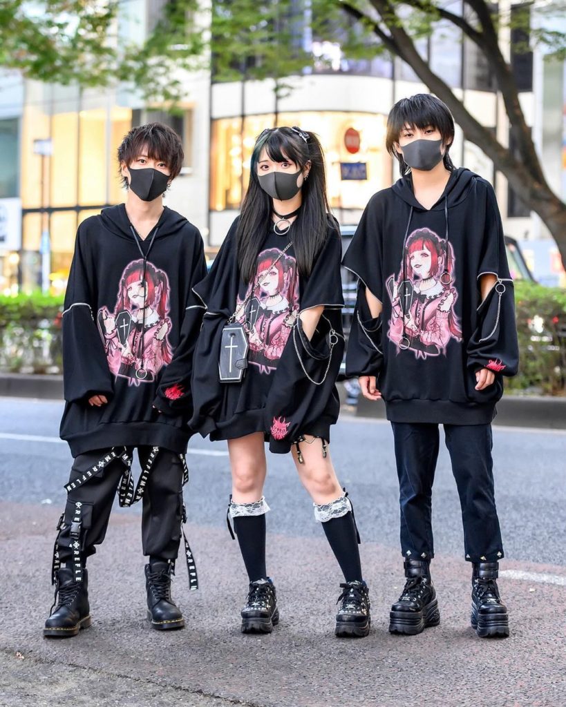 Japanese friends Yusuke, Akari (@shinryaku.net.jp), and L on the street in Haraj...