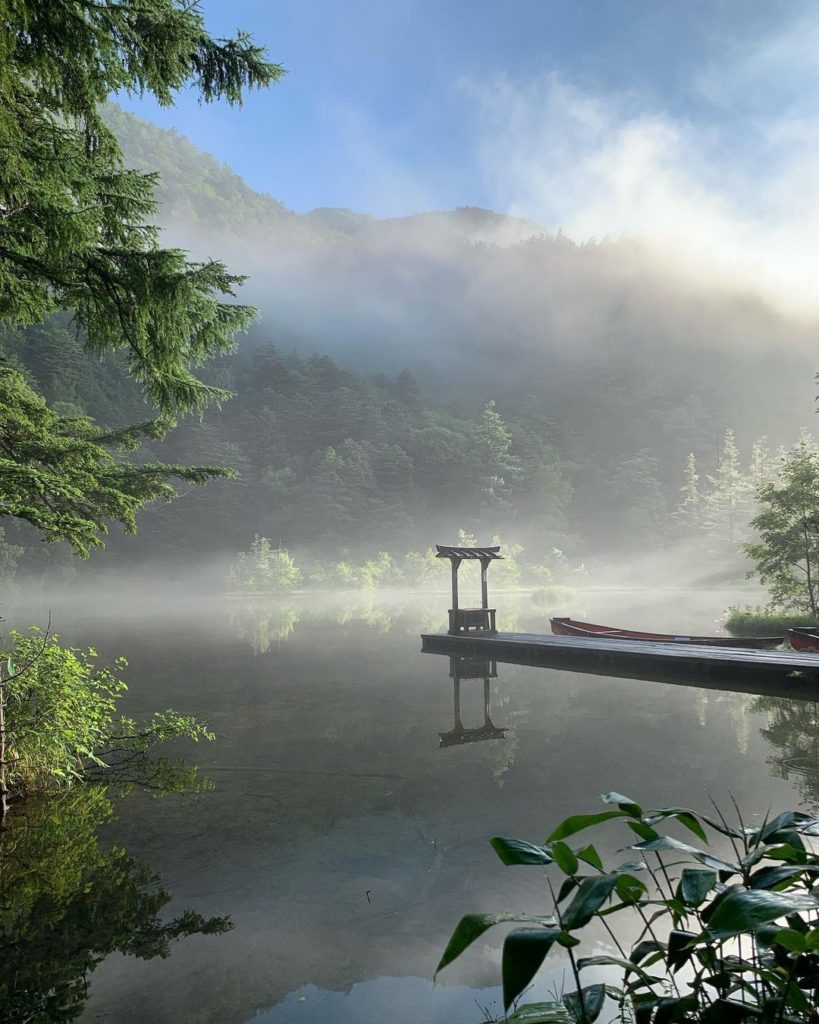 Shrouded in a mysterious tranquillity, Myojin Pond in Kamikochi in Nagano is env...