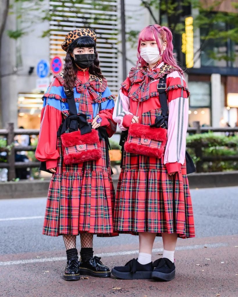 Mami (@mami_roppy) and Akari (@akari07k) on the street in Harajuku wearing HEIHE...