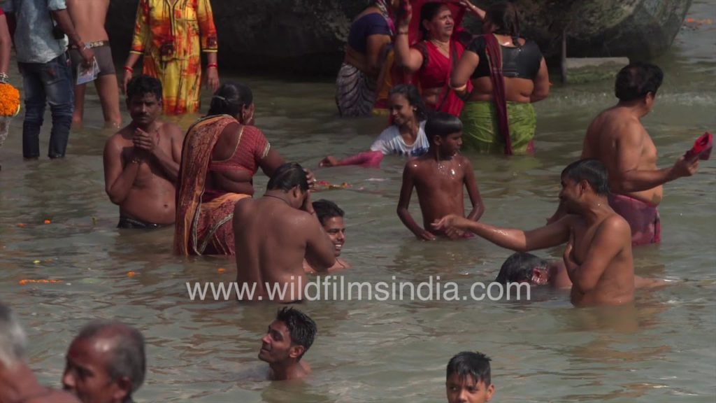 Mass bathing at the Ganga River in India | The Holy Dip