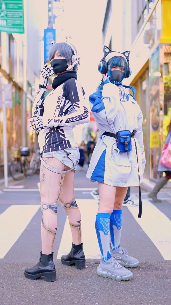 Japanese cyborg artist Yukie & Shiina in cyborg fashion on the street in Harajuk...