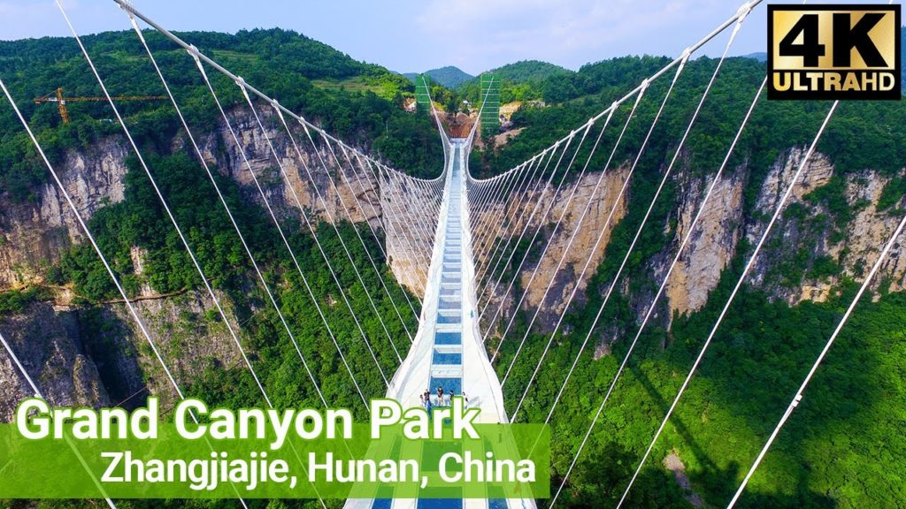 Walk on the World's Tallest & Longest Glass Bridge – Zhangjiajie Grand Canyon – 4K Ultra HD Walk on the World's Tallest & Longest Glass Bridge - Zhangjiajie Grand Canyon - 4K Ultra HD