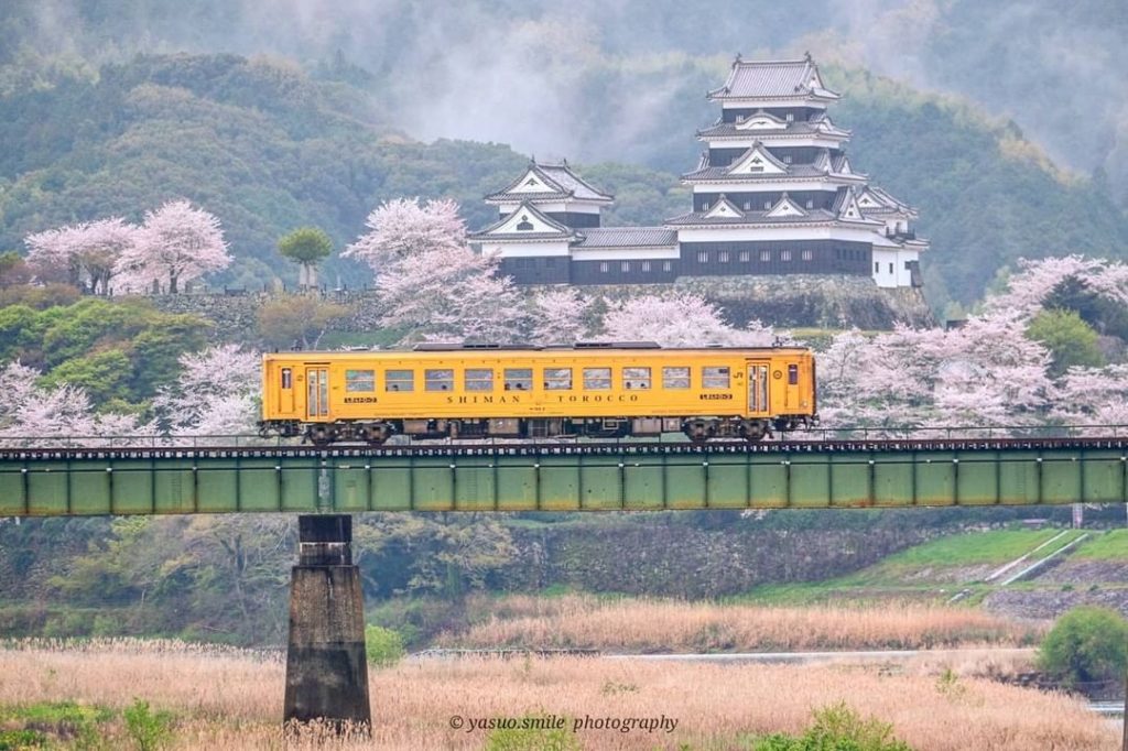 What caught your eye first, the grand castle or local train? 
Riding on the Shim...