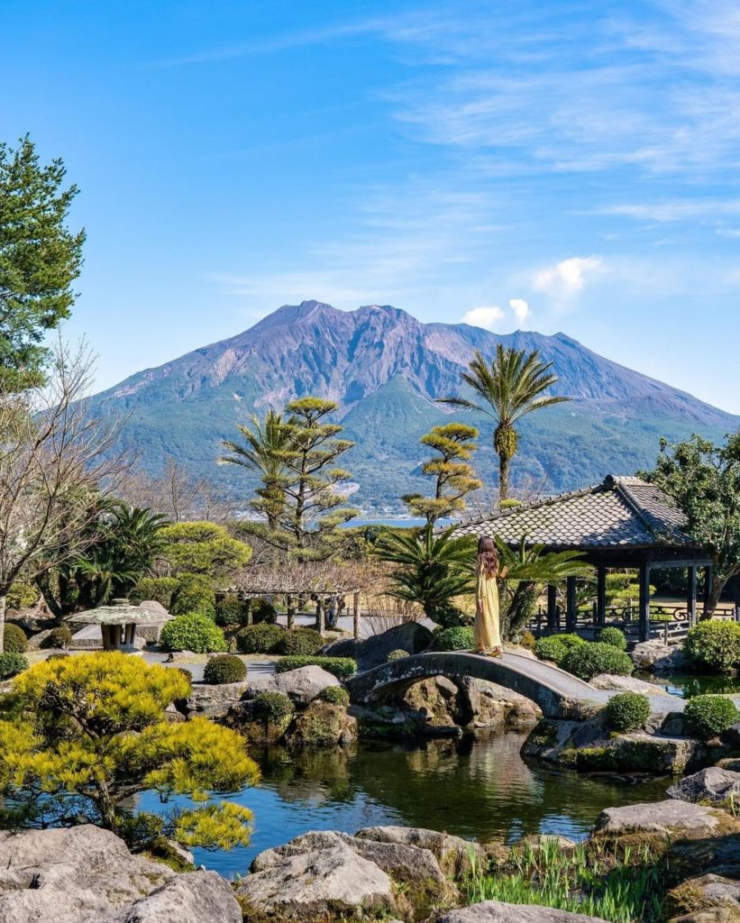 Isn't this view of a Japanese garden with a grand mountain in the background stu...