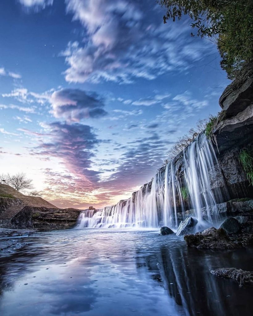 Kurotaki Falls in Yoshikawacho, Hyogo, stretches over 100 feet in two graceful t...