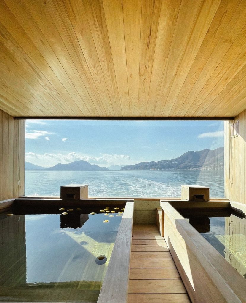 A citrus-scented bath with changing views of the Seto Inland Sea unfolding befor...