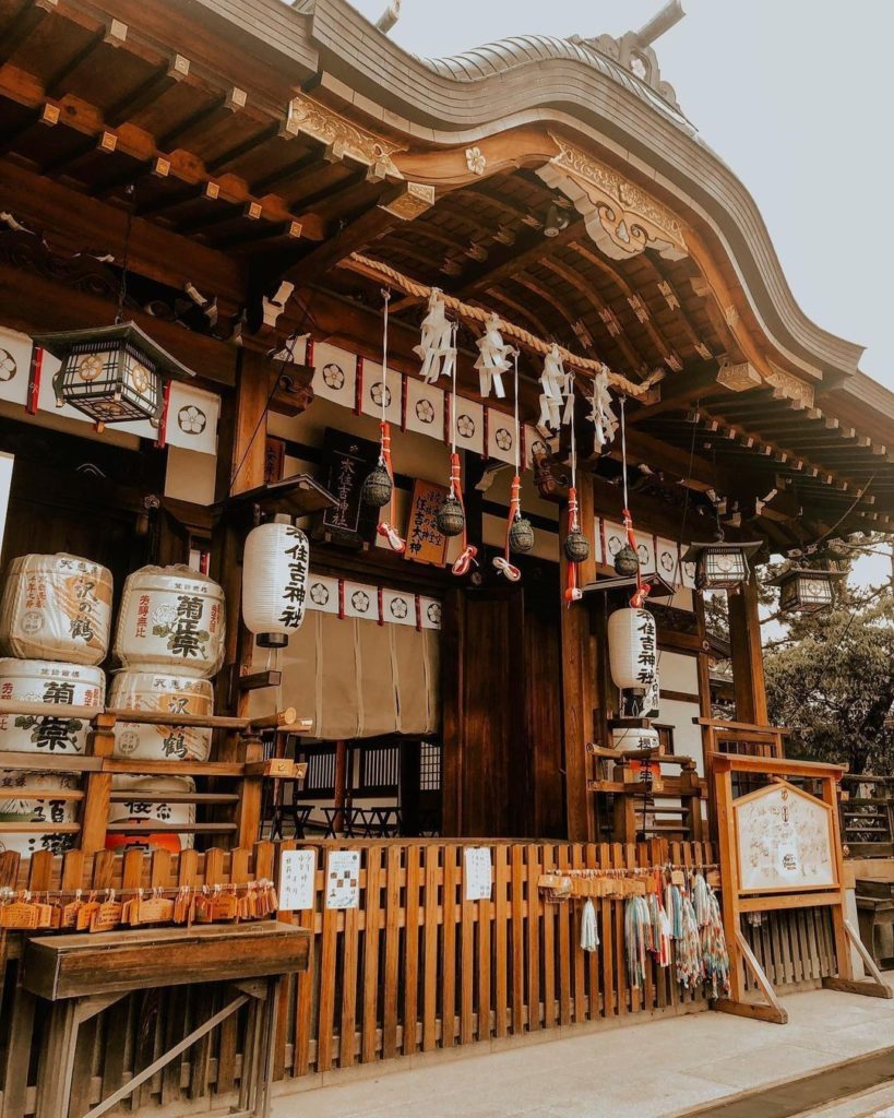 Huge sake casks stacked up at a shrine? Whatever for? 
Celebrations and festival...