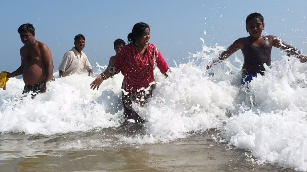 People are Enjoying Sea Bath at PURI Sea Beach, India in 4k ultra HD