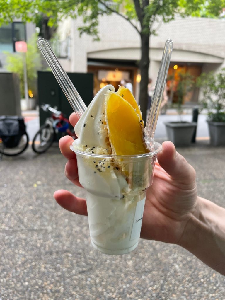 Salty milk soft serve with deep-fried sweet potato, topped with crispy tempura bits