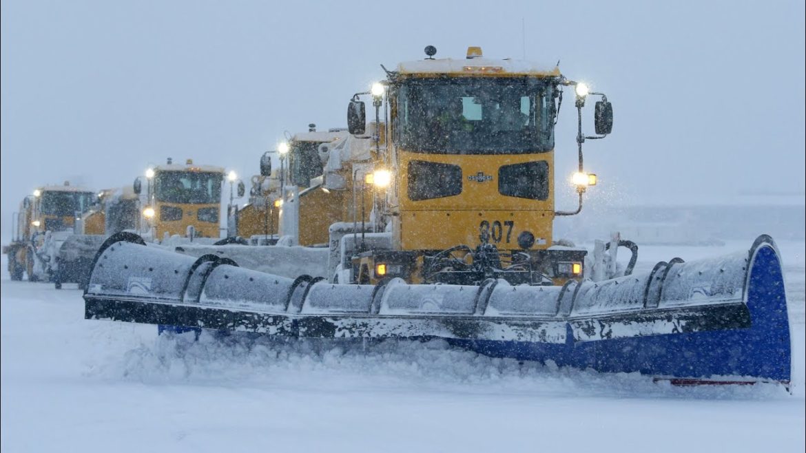 Clearing Mitchell's Airports runways a choreographed snow dance powered by massive diesel engines Clearing Mitchell's Airports runways a choreographed snow dance powered by massive diesel engines