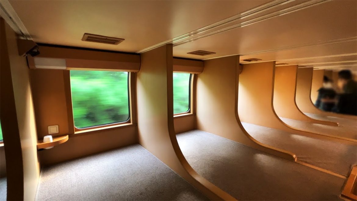 Trying Japan's Overnight Sleeper Train - CHEAPEST Seat "Nobi-Nobi" | Sunrise Express