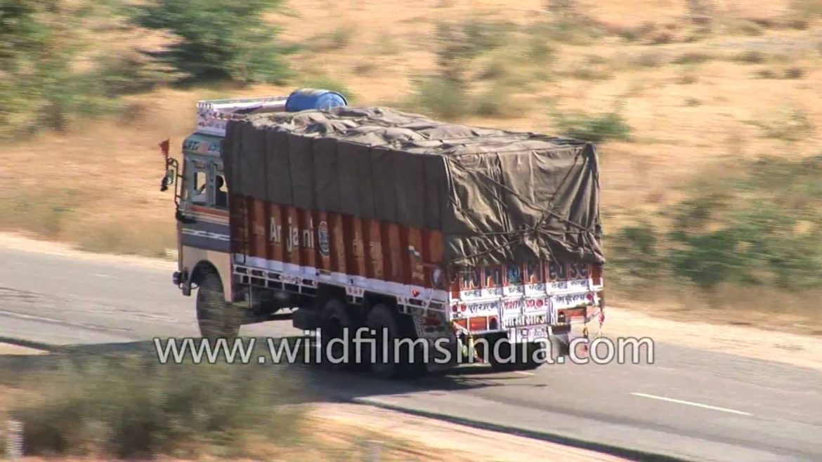 Truck traffic on Jodhpur highway in Rajasthan Truck traffic on Jodhpur highway in Rajasthan