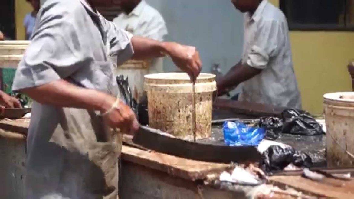 Fish Choppers at Mapusa Market, Goa India