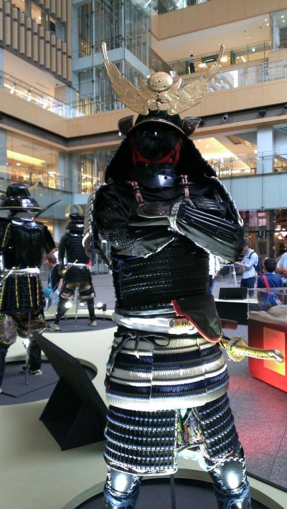 Display of samurai armor. This is a replica of Uesugi Kagekatsu's Armor. Uesugi was originally a military leader for Toyotomi Hideyoshi. After Hideyoshi's death Uesugi was the first of the 5 regents to openly rebel against Tokugawa.
