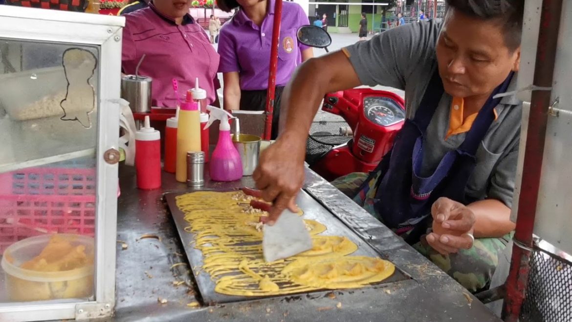 Thai food (Khanom Tokyo) in Chiang Mai street food market Thailand
