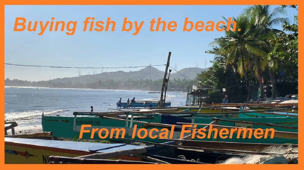Buying fresh fish from local fishermen Labrador Pangasinan