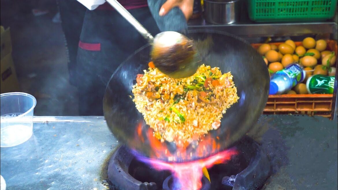 Chinese Street Food -Night market master egg fried rice fried noodles, rice cake, stone cake Chinese Street Food -Night market master egg fried rice fried noodles, rice cake, stone cake