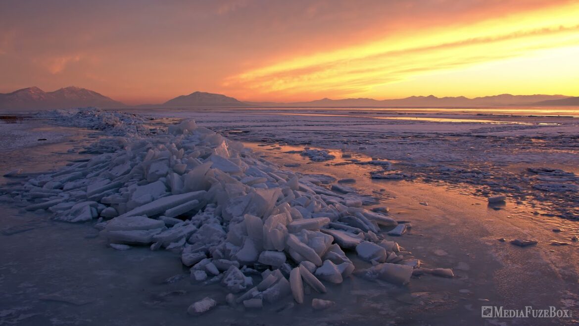 Winter landscape over piles of broken ice on Utah Lake at sunset Winter landscape over piles of broken ice on Utah Lake at sunset