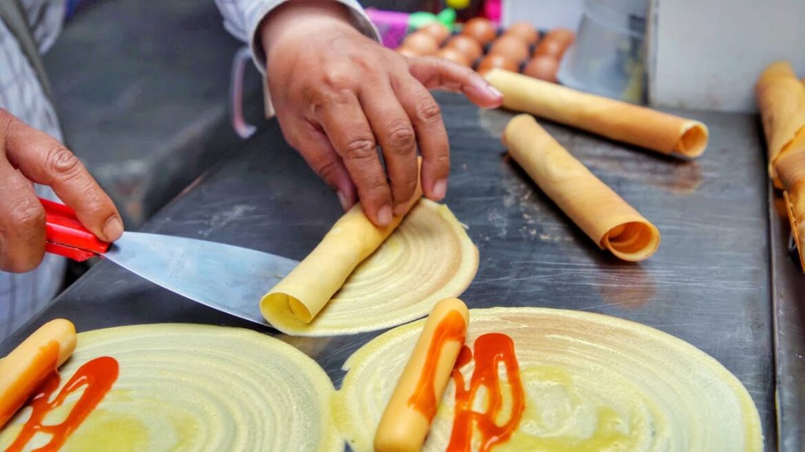 Popular Thai snack “Tokyo roll” ($1). Street food Bangkok. Popular Thai snack "Tokyo roll" ($1). Street food Bangkok.