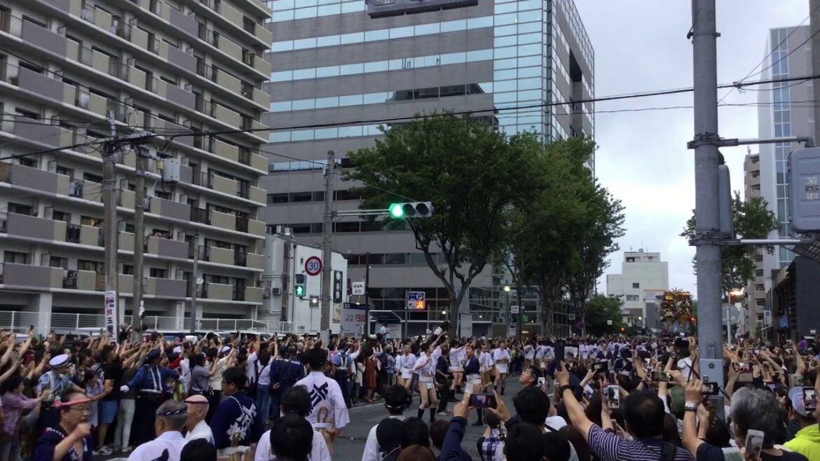Fukuoka Day Tours is in the middle of Hakata experiencing the Yamakasa Festival.