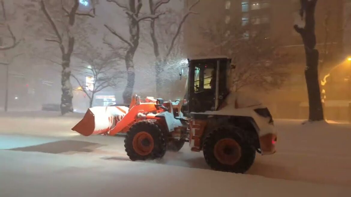 Walking in the heavy snow at midnight in Sapporo, Hokkaido, Japan Walking in the heavy snow at midnight in Sapporo, Hokkaido, Japan