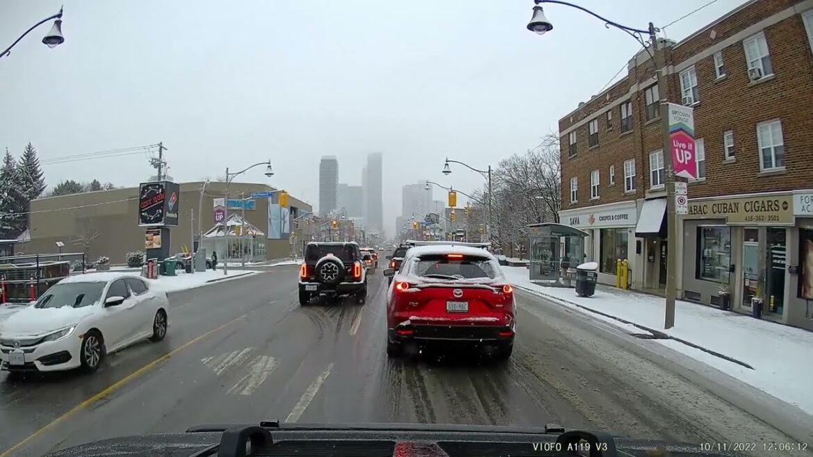 Driving to Toronto Downtown Snowfall on Yonge Street from North York