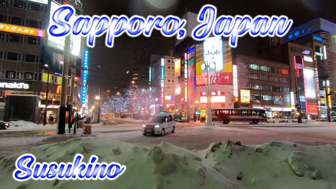 Walking in Hokkaido, Japan. Walk at Susukino at Snowy night in Sapporo. ORANGE ua